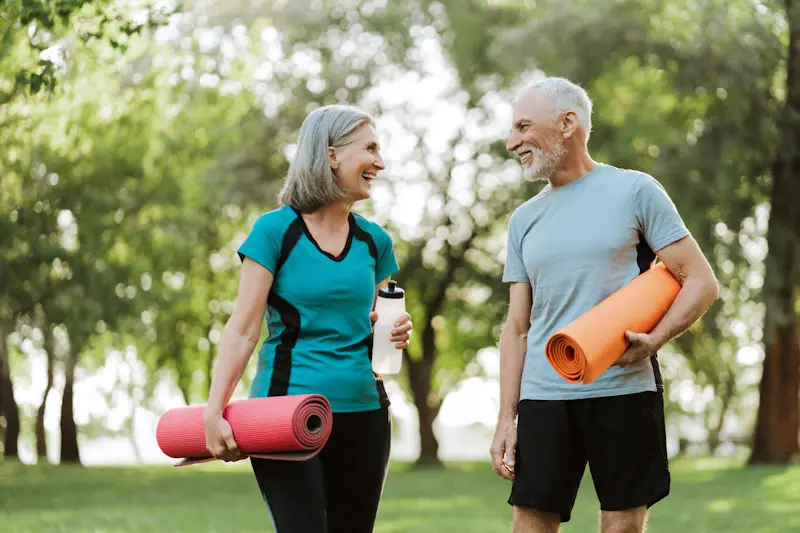 Couple with yoga mats