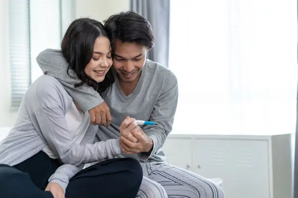 Couple with pregnancy test